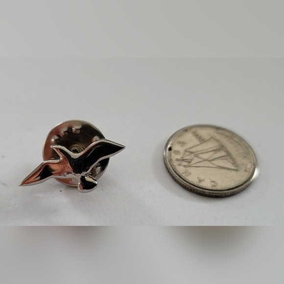 Silver-tone bird lapel pin stamped H.A.S Marketing. - Picture 3 of 4